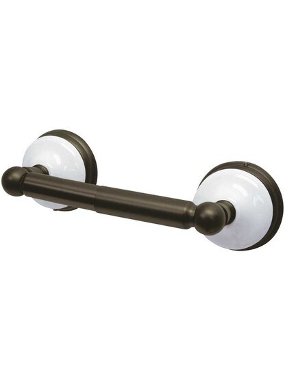 Cumberland Toilet Paper Holder with Brass and White Porcelain Rosettes.